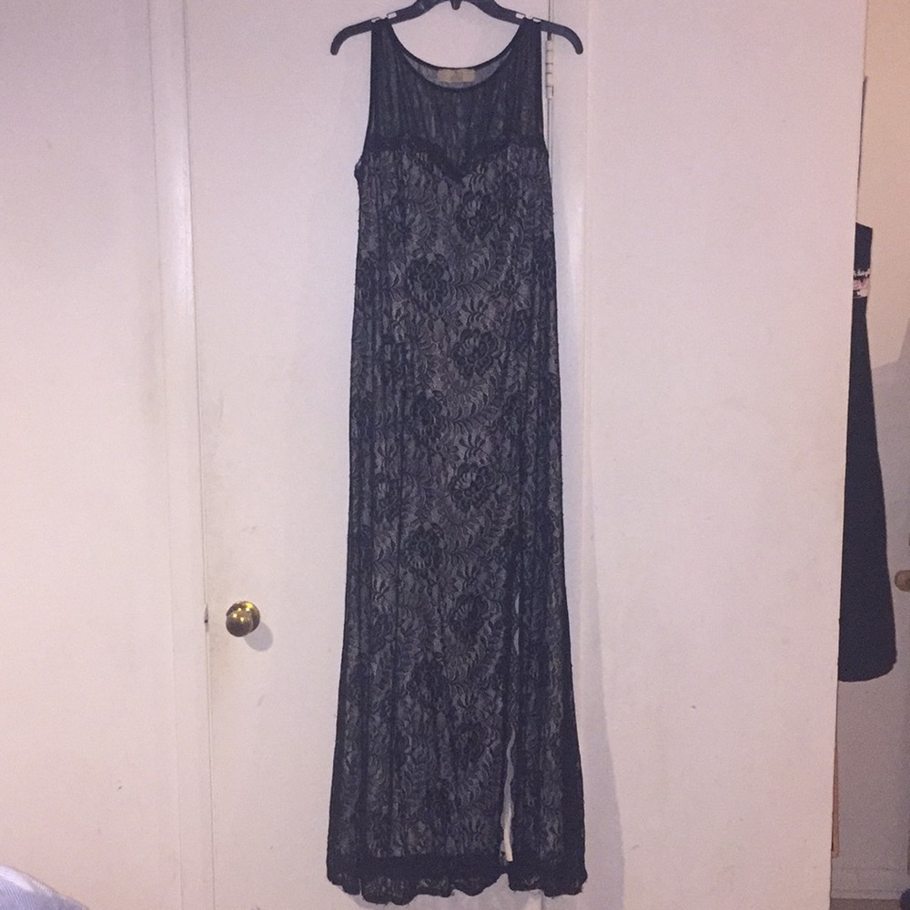 A long black lace formal dress.